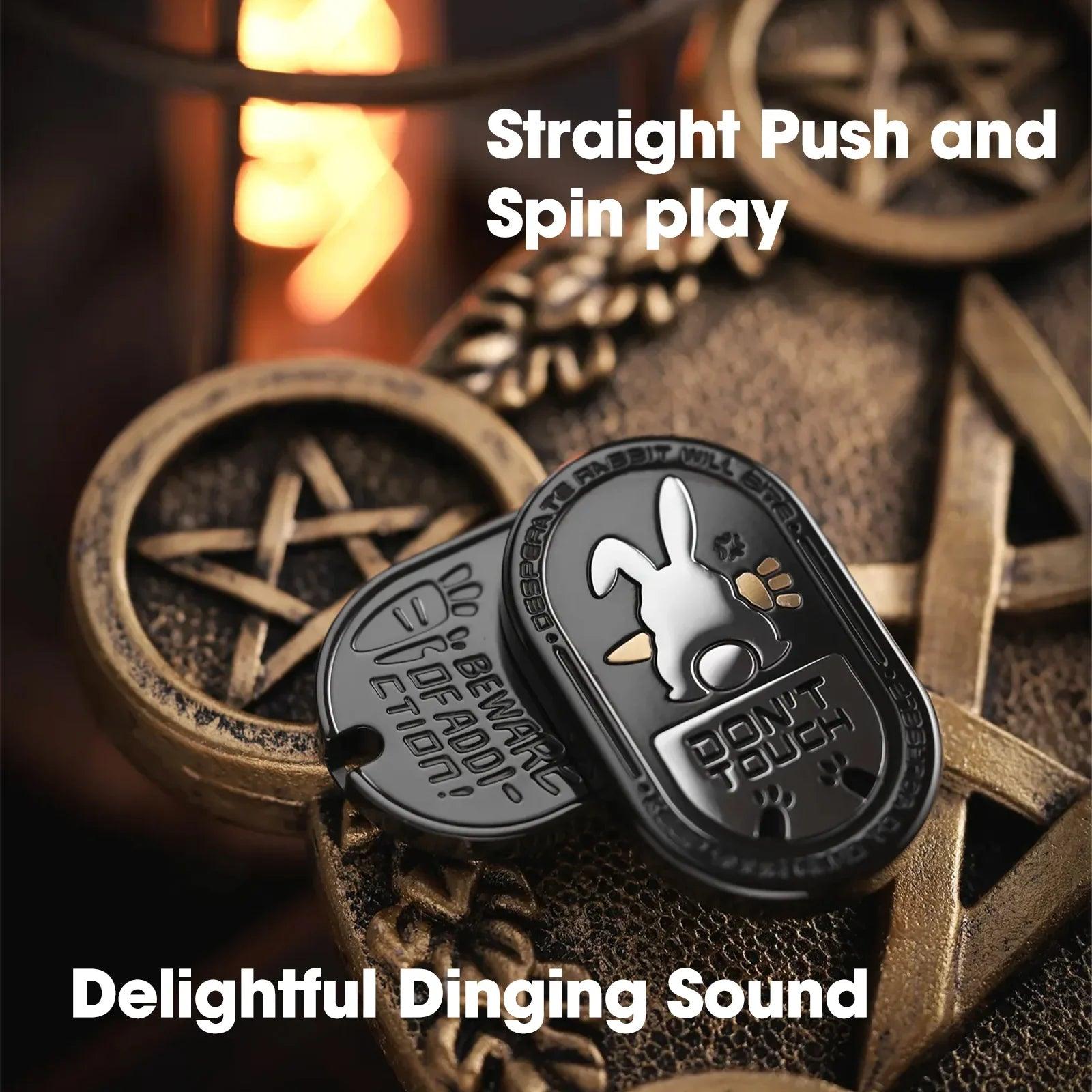 black metal rabbit fidget slider for adults, with a satisfying ding, for stress and focus at the desk