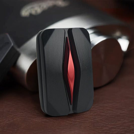 black metal Mountain trackless fidget slider with red core for adults, close-up showing the design and finish