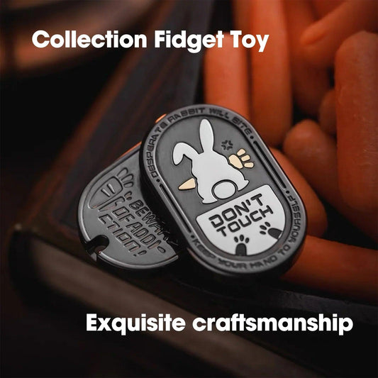 black metal rabbit fidget slider for adults, close-up of the engraved detail and mechanical push-slide