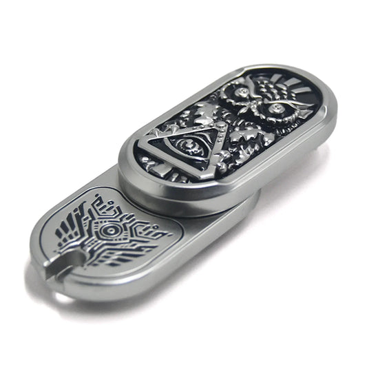 metal rotating magnetic fidget slider with engraved owl design for adults, close-up showing the design and finish